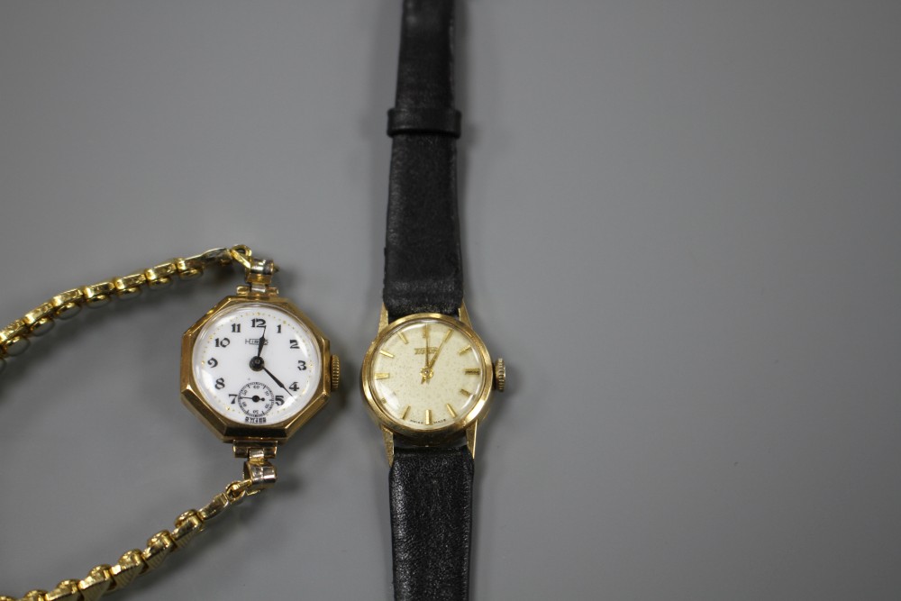 Two ladys 9ct gold wrist watches, Tissot and Hirco, on leather and gold plated flexible strap, respectively,